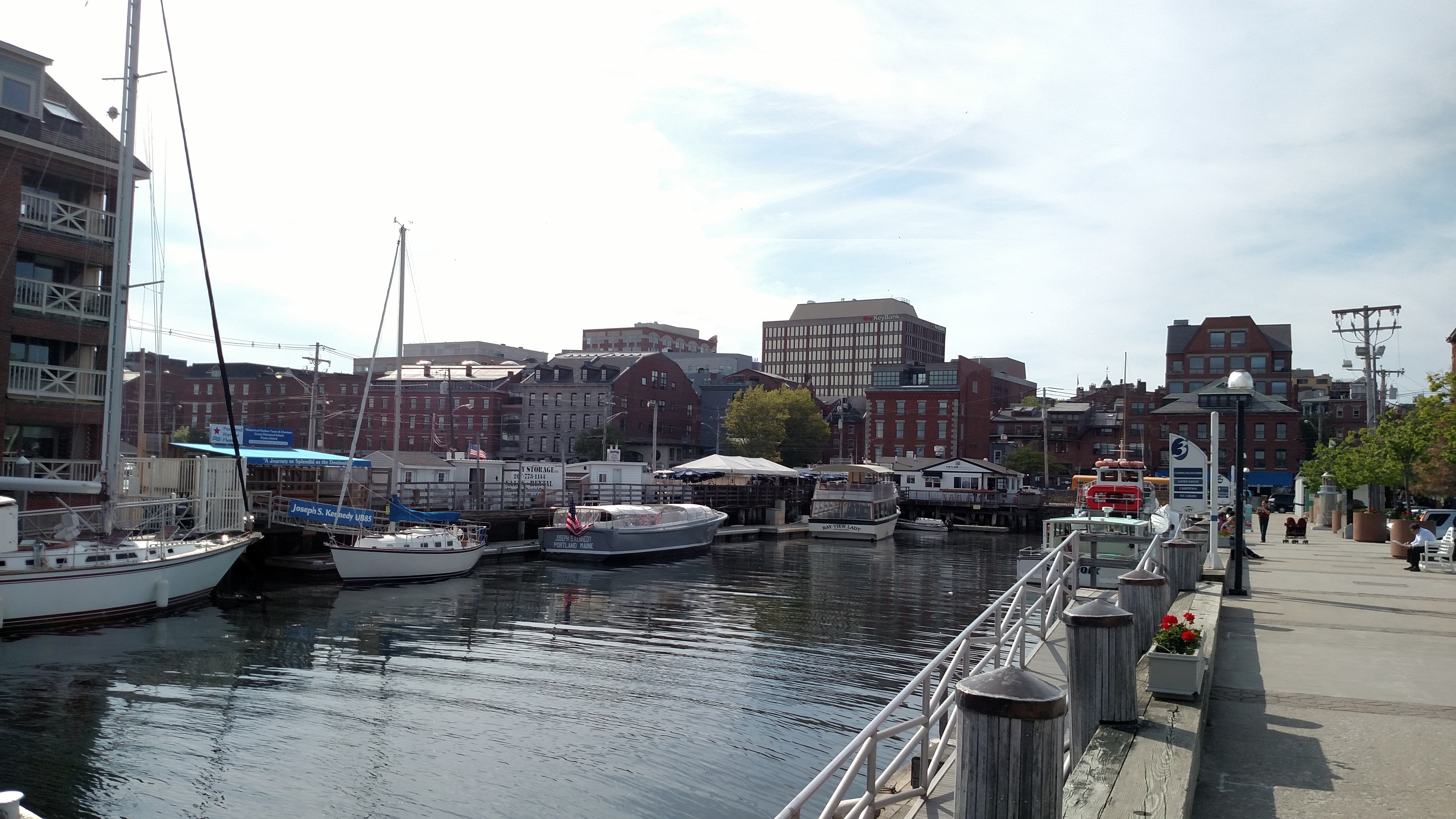Portland Pier in the Old Port district with sailboats and harbor
